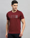 Men Maroon Self Design Round Neck Half Sleeve T-Shirt