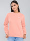 Women Peach Solid Round Neck Full Sleeve Sweatshirt